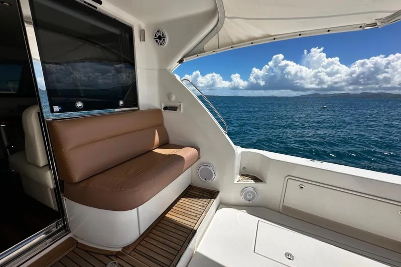  Yacht Photos Pics Luxurious 2012 Riviera 43 Flybridge yacht interior with ocean view and comfortable seating.