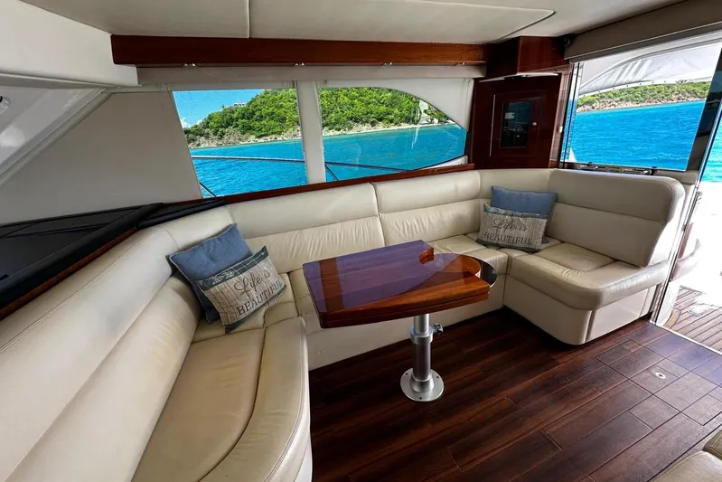  Yacht Photos Pics Luxurious interior of 2012 Riviera 43 Flybridge yacht with ocean view.