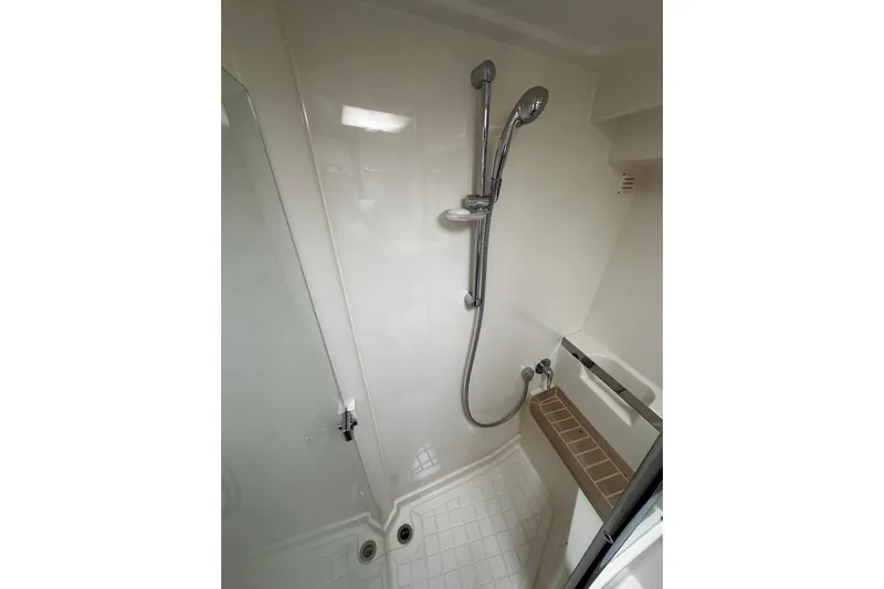  Yacht Photos Pics Shower area in 2012 Riviera 43 Flybridge yacht, featuring modern fixtures and clean design.