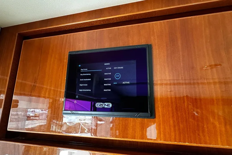  Yacht Photos Pics Touchscreen control panel on 2012 Riviera 43 Flybridge yacht, displaying cruise modes.