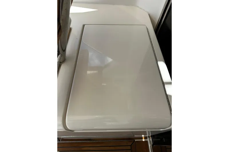  Yacht Photos Pics Riviera 43 Flybridge 2012 yacht interior detail, featuring sleek white surface design.