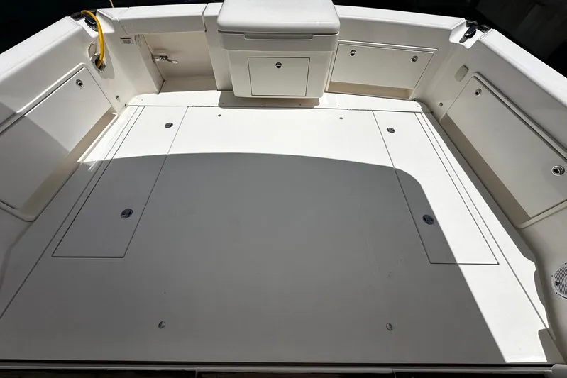  Yacht Photos Pics 2012 Riviera 43 Flybridge boat deck with storage compartments and seating.