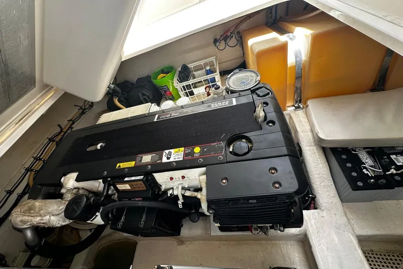  Yacht Photos Pics Engine compartment of 2012 Riviera 43 Flybridge yacht, showcasing detailed mechanical components.