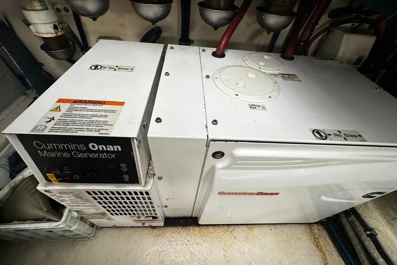  Yacht Photos Pics Cummins Onan marine generator in 2012 Riviera 43 Flybridge engine room.