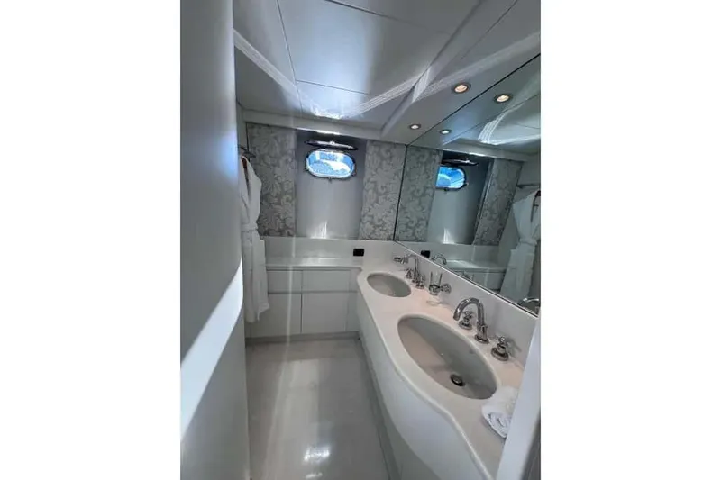  Yacht Photos Pics Luxurious bathroom in 2000 Sanlorenzo SL88 yacht with dual sinks and elegant design.