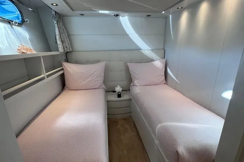  Yacht Photos Pics Twin cabin interior of 2000 Sanlorenzo SL88 yacht with modern design and soft lighting.