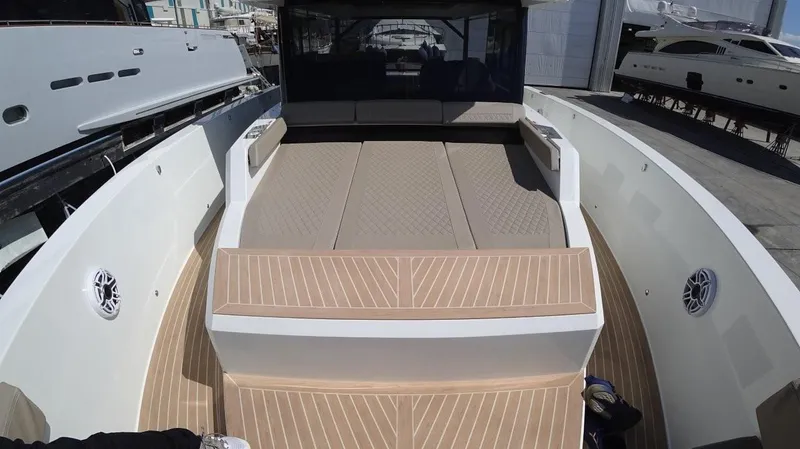  Yacht Photos Pics 2024 De Antonio Yachts D50 deck with modern seating and sleek design.