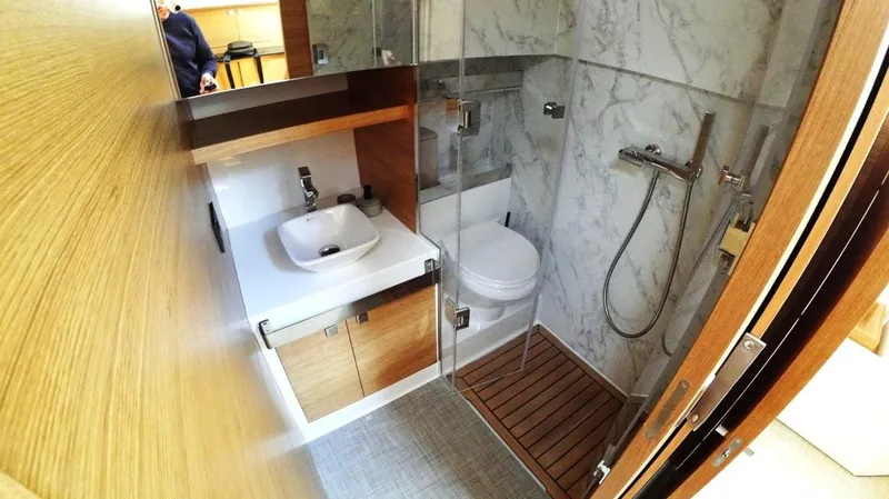  Yacht Photos Pics Luxurious bathroom in 2024 De Antonio Yachts D50, featuring modern fixtures and elegant design.