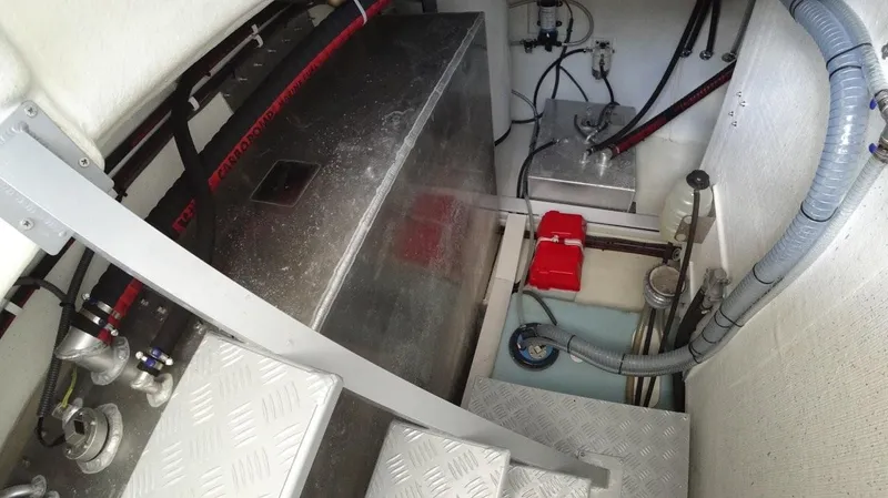  Yacht Photos Pics Engine room of 2024 De Antonio Yachts D50, showcasing mechanical components and piping.