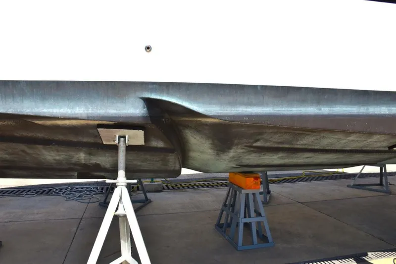  Yacht Photos Pics 2024 De Antonio Yachts D50 hull on stands, showcasing sleek design and craftsmanship.