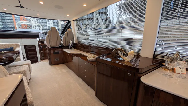 New 2025 Model Yacht Photos Pics Luxurious interior of 2025 Fairline Squadron 58 yacht with elegant furnishings and modern design.