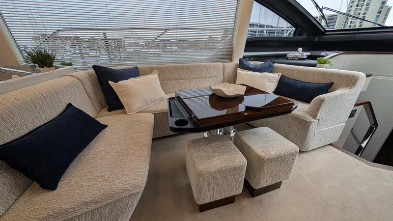 New 2025 Model Yacht Photos Pics Luxurious interior of 2025 Fairline Squadron 58 yacht with elegant seating and modern decor.