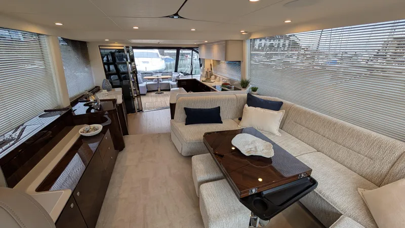 New 2025 Model Yacht Photos Pics Luxurious interior of 2025 Fairline Squadron 58 yacht with modern furnishings and elegant design.