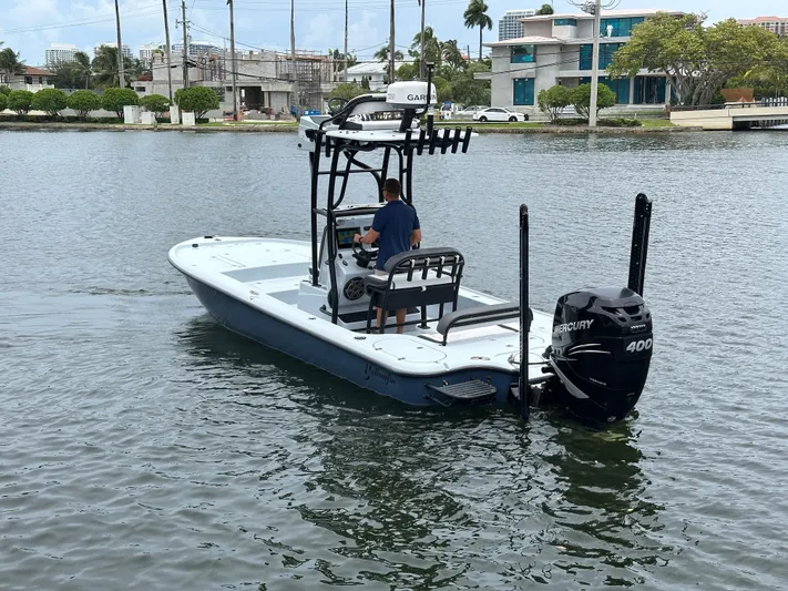  Yacht Photos Pics 2019 Yellowfin 24 Bay CE boat on water, featuring Mercury 400 engine.