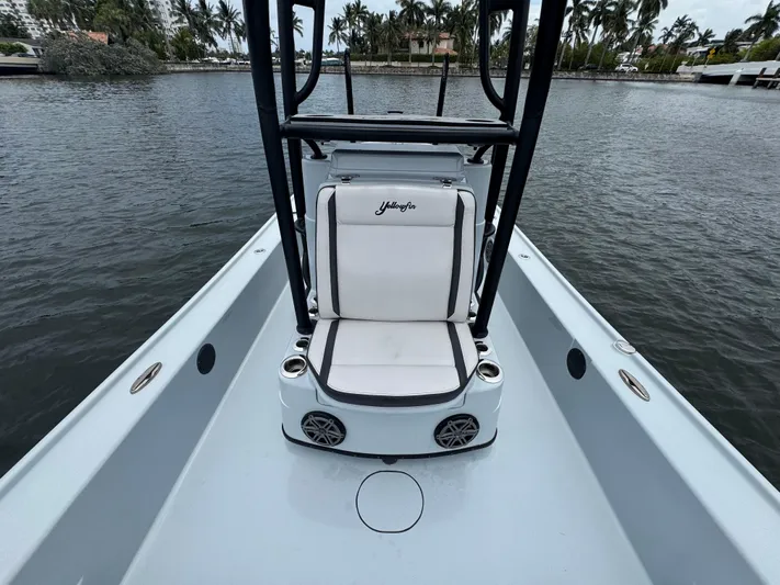  Yacht Photos Pics 2019 Yellowfin 24 Bay CE boat interior with seating and water view.