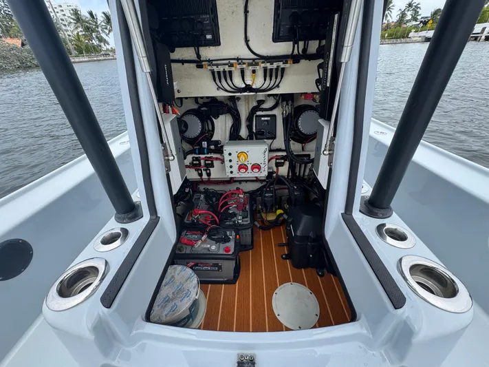  Yacht Photos Pics 2019 Yellowfin 24 Bay CE boat interior showing electrical components and wiring.