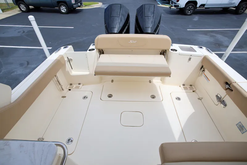  Yacht Photos Pics 2022 Scout 277 Dorado boat interior with seating and storage compartments.