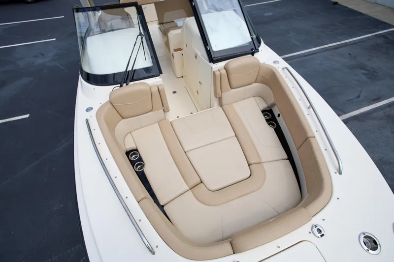  Yacht Photos Pics 2022 Scout 277 Dorado boat with spacious beige seating and sleek design.