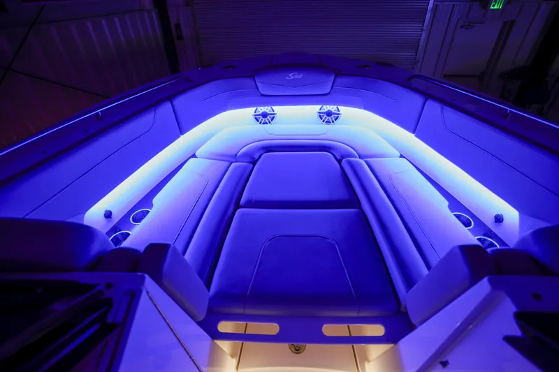  Yacht Photos Pics 2022 Scout 277 Dorado boat interior with blue LED lighting.