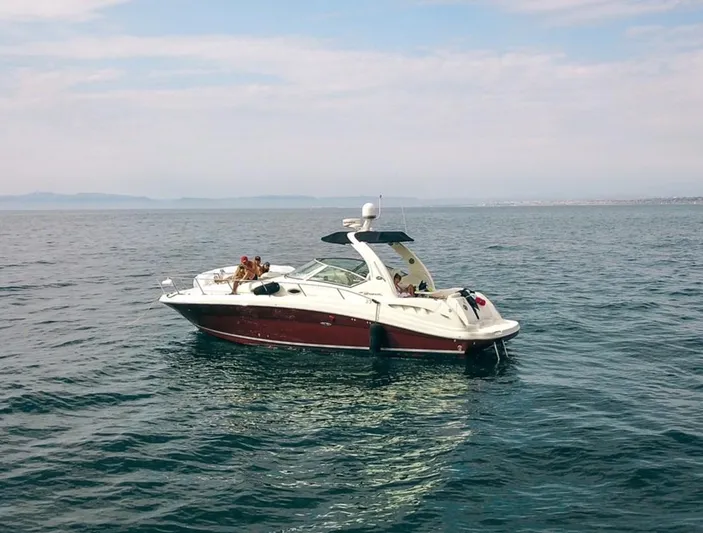 Good Kitty Yacht Photos Pics 2006 Sea Ray 340 Sundancer yacht cruising on open water under a clear sky.