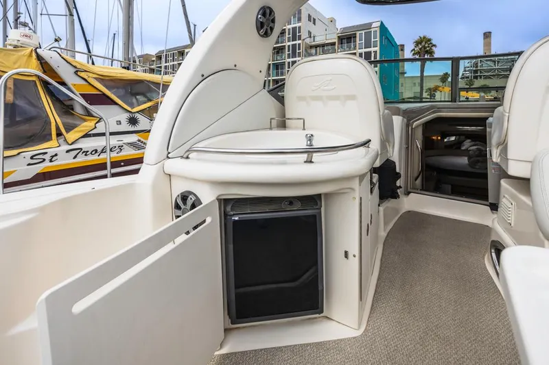 Good Kitty Yacht Photos Pics 2006 Sea Ray 340 Sundancer interior with kitchenette and open cabin view.