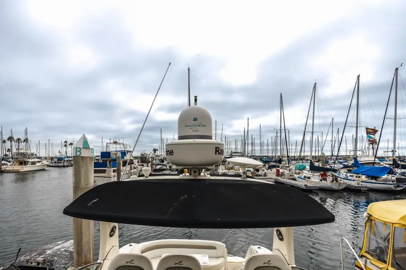 Good Kitty Yacht Photos Pics 2006 Sea Ray 340 Sundancer docked at a marina with sailboats in the background.