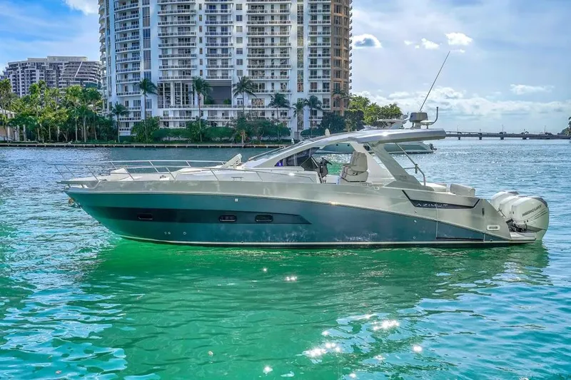  Yacht Photos Pics 2020 Azimut Verve 40 yacht on turquoise water with cityscape background.