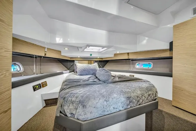  Yacht Photos Pics Luxurious cabin interior of 2020 Azimut Verve 40 yacht with cozy bedding.