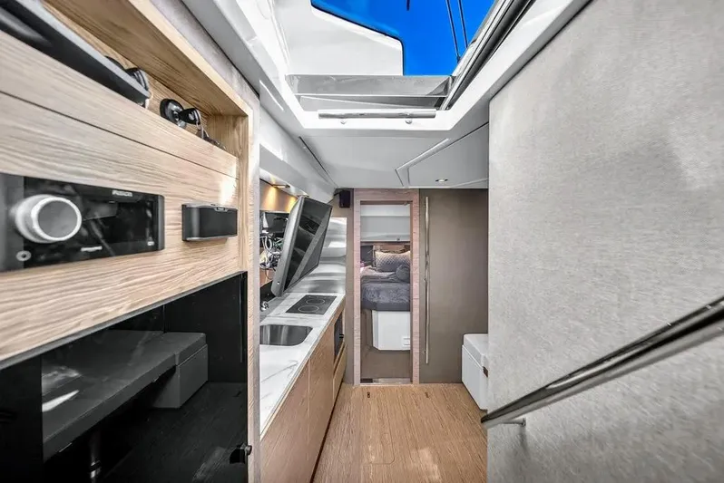  Yacht Photos Pics Luxurious interior of 2020 Azimut Verve 40 yacht with modern amenities and sleek design.