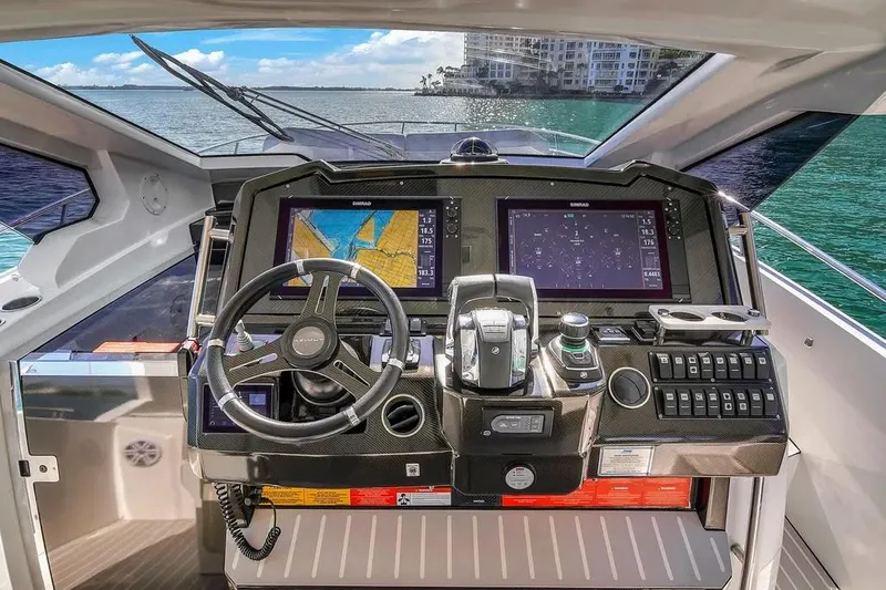  Yacht Photos Pics Cockpit of 2020 Azimut Verve 40 yacht with advanced navigation systems and steering wheel.