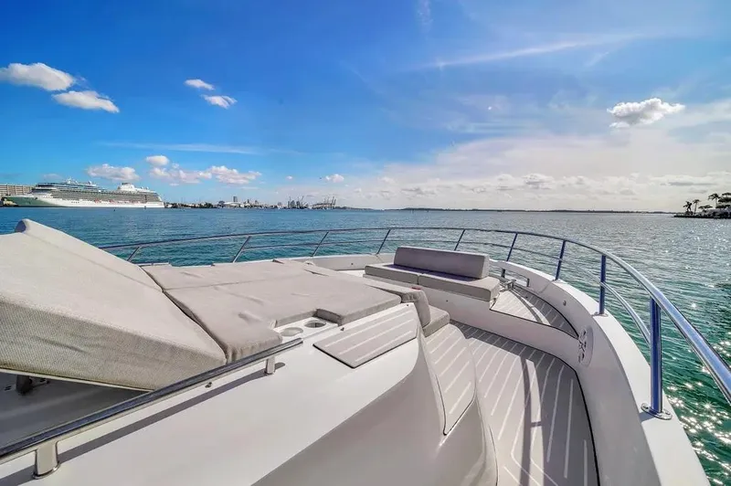  Yacht Photos Pics Luxurious 2020 Azimut Verve 40 yacht deck with ocean view and clear blue sky.