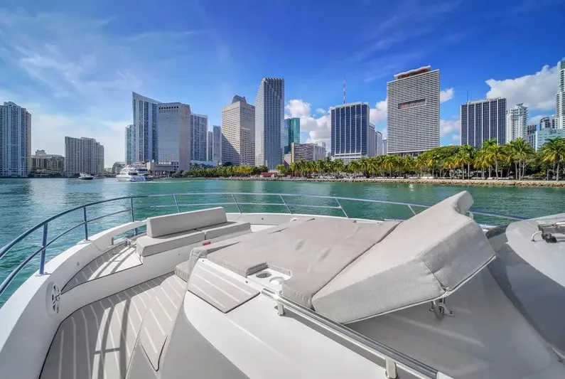  Yacht Photos Pics 2020 Azimut Verve 40 yacht cruising near city skyline and waterfront.