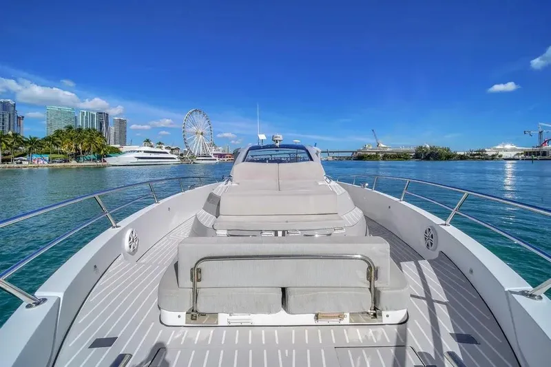  Yacht Photos Pics 2020 Azimut Verve 40 yacht on water with city skyline and Ferris wheel.