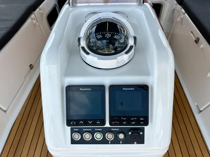 Kemosabe Yacht Photos Pics Jeanneau Sun Odyssey 440 cockpit with compass and Raymarine displays, 2021 model.