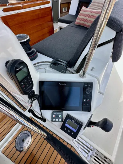 Kemosabe Yacht Photos Pics Cockpit of 2021 Jeanneau Sun Odyssey 440 with navigation equipment and seating.