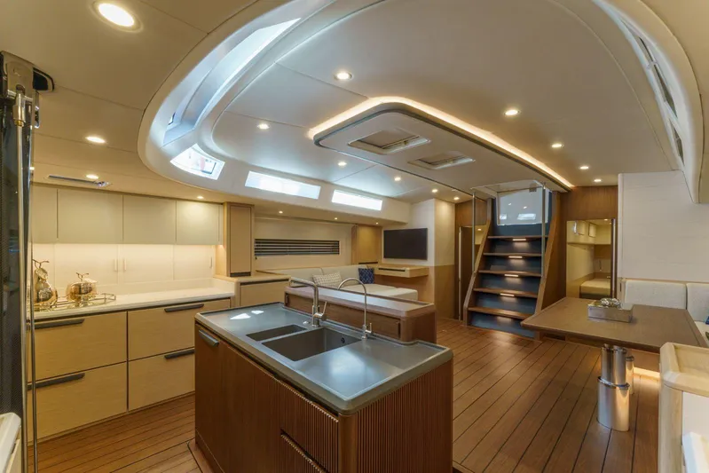  Yacht Photos Pics Luxurious interior of 2026 Ice Yachts ICE 66 Farr, featuring modern kitchen and elegant design.