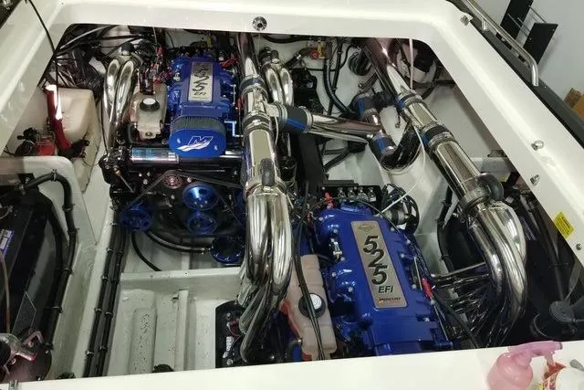 Tiret Yacht Photos Pics 2004 Fountain 42 Lightning engine compartment with dual 525 EFI engines and polished exhausts.