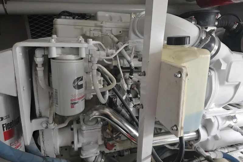 Junior 2 Yacht Photos Pics Close-up of a 2008 Post 42 engine with visible filters and components.
