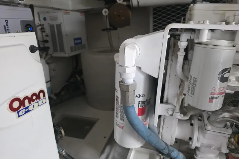 Junior 2 Yacht Photos Pics Engine room with Onan generator and Fleetguard filters, Post model 42, 2008.