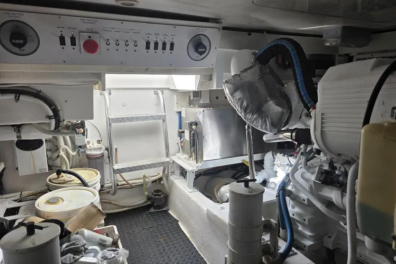 Junior 2 Yacht Photos Pics Engine room of a 2008 Post 42 boat, featuring machinery and control panels.