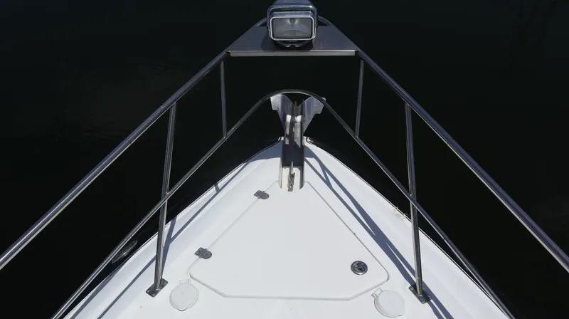 Seas The Day Yacht Photos Pics Bow view of 2012 Cruisers Yachts 350 Express with stainless steel railings.