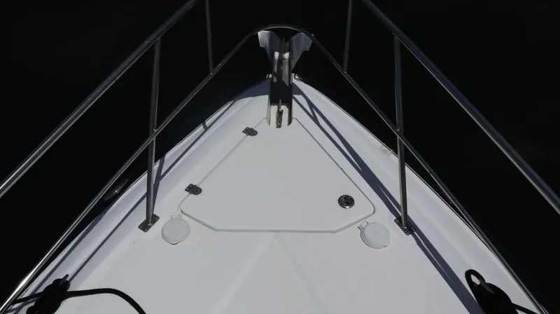 Seas The Day Yacht Photos Pics Bow view of 2012 Cruisers Yachts 350 Express with stainless steel railings.