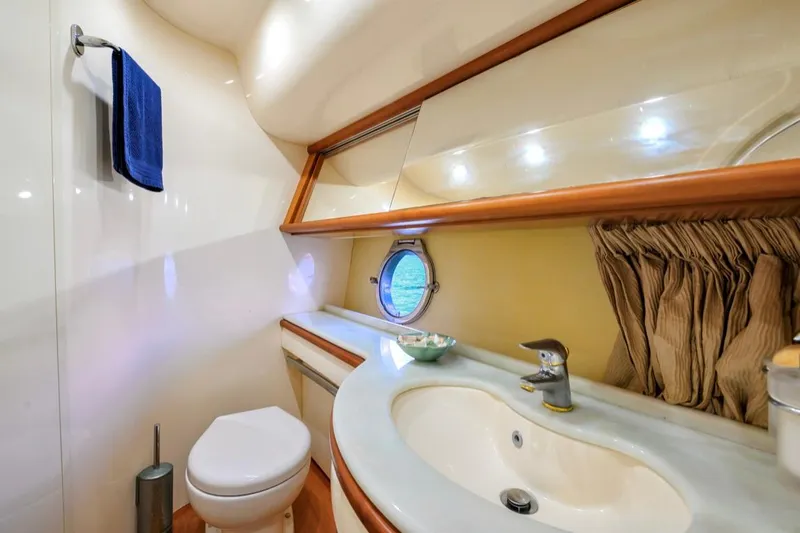 La Dolce Vita 2 Yacht Photos Pics Luxurious bathroom interior of 2010 Azimut 62 Evolution yacht with modern fixtures.