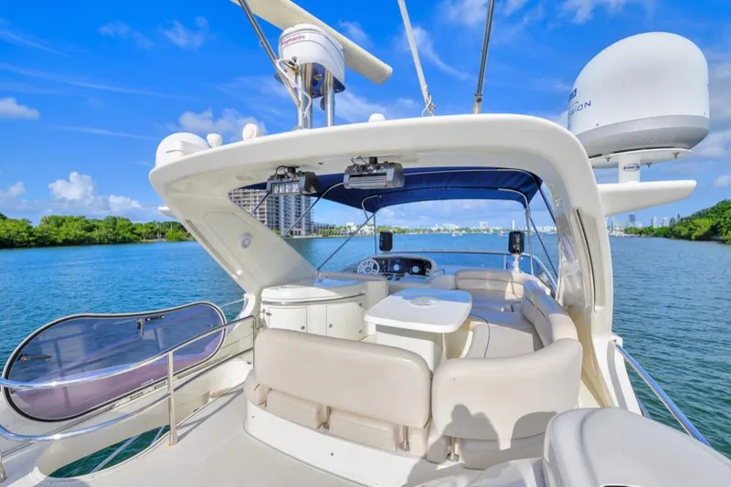 La Dolce Vita 2 Yacht Photos Pics Luxurious 2010 Azimut 62 Evolution yacht interior with scenic water view.