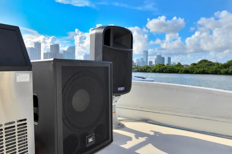 La Dolce Vita 2 Yacht Photos Pics Speakers on 2010 Azimut 62 Evolution yacht with city skyline and water view.