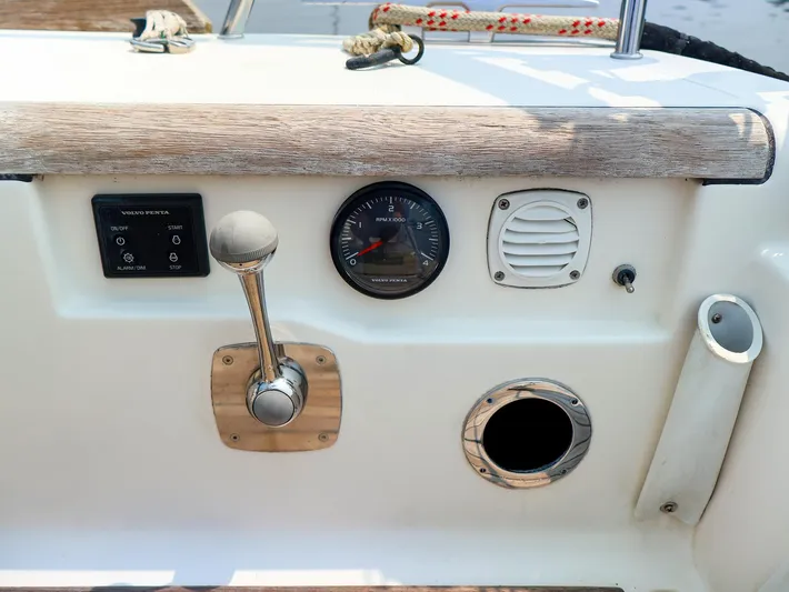  Yacht Photos Pics Control panel of a 2011 Dufour 40E Performance sailboat with throttle and gauges.