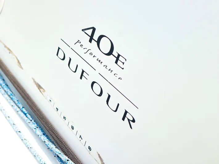  Yacht Photos Pics Dufour 40E Performance 2011 yacht logo on white surface with ropes.