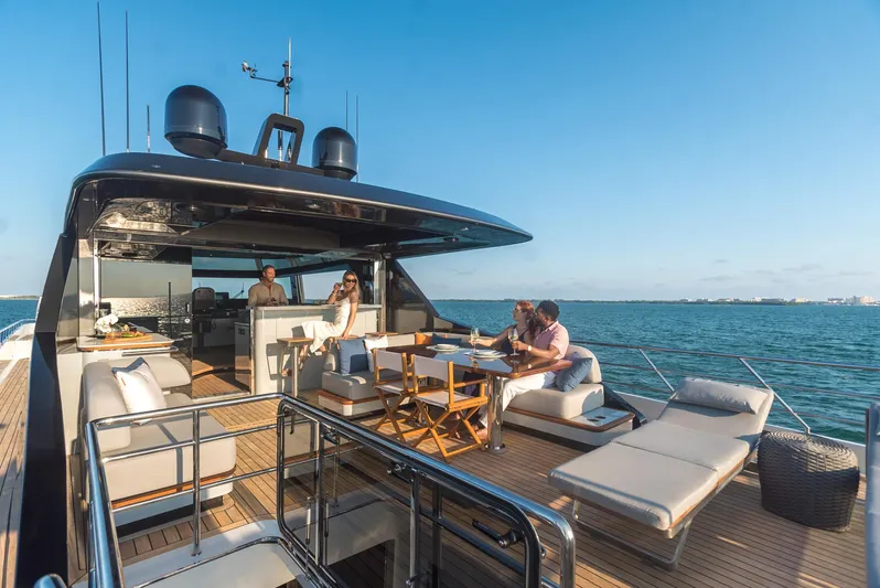  Yacht Photos Pics Luxurious 2022 CL Yachts CLX96 with spacious deck, ocean view, and elegant seating area.