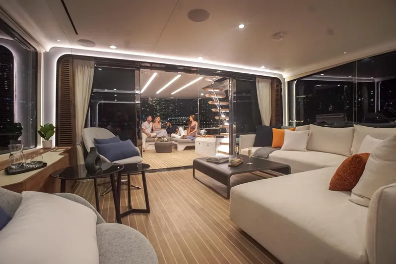  Yacht Photos Pics Luxurious interior of 2022 CL Yachts CLX96 with modern seating and ambient lighting.