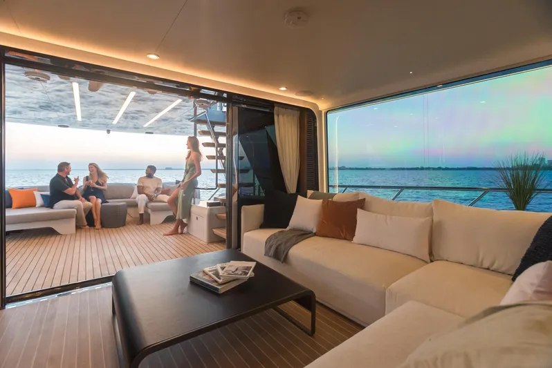  Yacht Photos Pics Luxurious interior of 2022 CL Yachts CLX96 with ocean view and outdoor seating area.